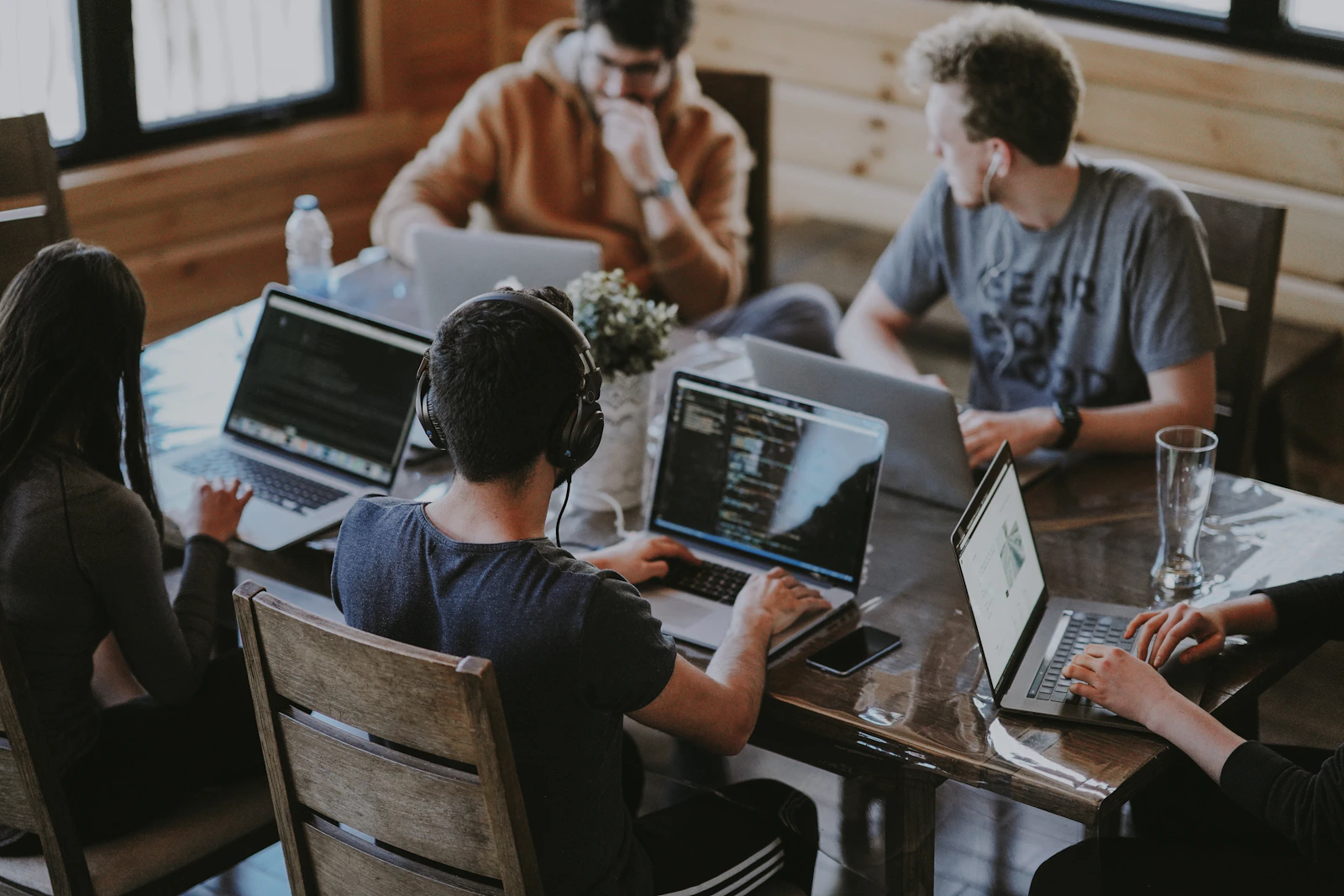 A collaborative engineering team in a bright workspace